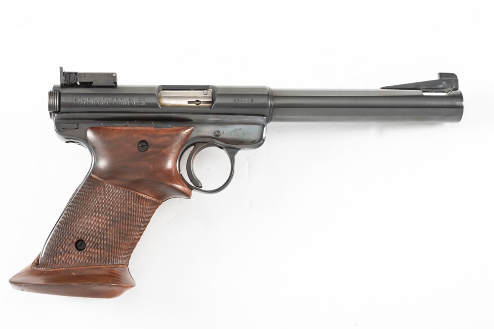 Custom Ruger Auto Pistol, .22 LR caliber, SN 224412, blue finish, 5 1/2" custom target barrel by: Custom Ruger Auto Pistol, .22 LR caliber, SN 224412, blue finish, 5 1/2" custom target barrel by J.E. Clark, Shreveport, Louisiana custom trigger, custom thumb rest checkered grips. Very good conditio
