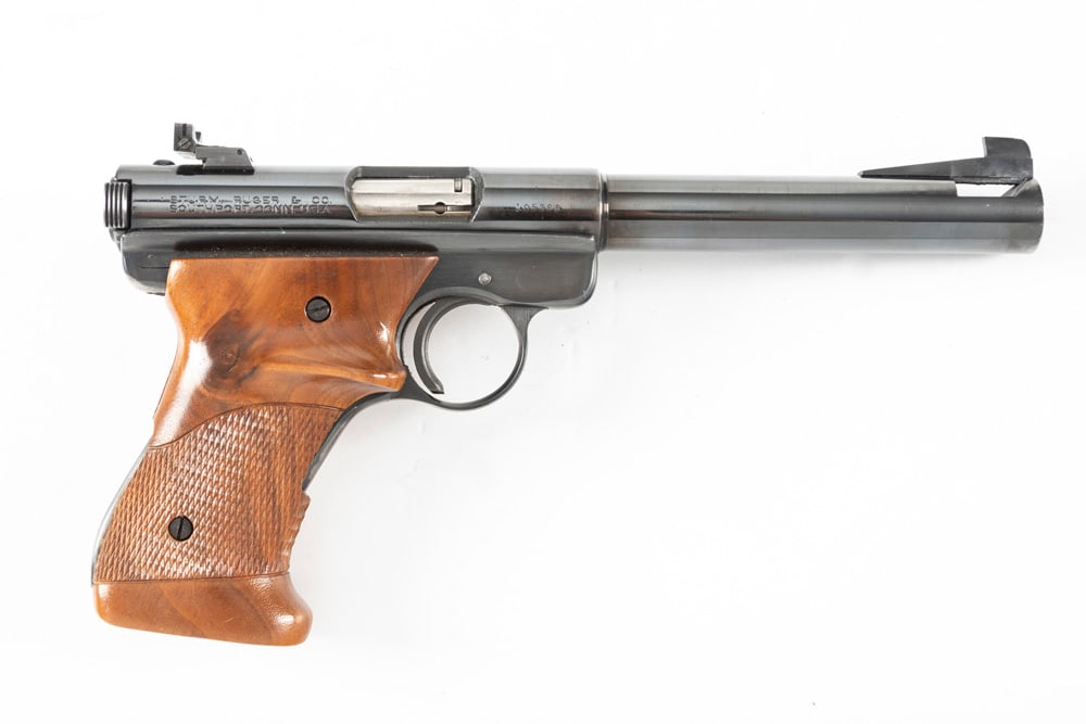 Custom Ruger Auto Pistol, .22 LR caliber, SN 105398, blue finish, 5 1/2" custom target barrel by: Custom Ruger Auto Pistol, .22 LR caliber, SN 105398, blue finish, 5 1/2" custom target barrel by J.E. Clark, Shreveport, Louisiana custom trigger, custom thumb rest checkered grips. Very good conditio