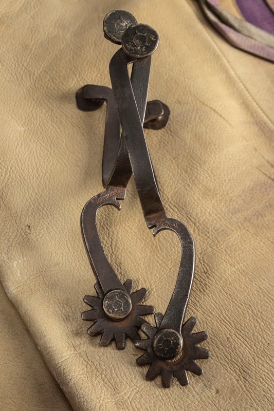 Pair of "J.C. Petmecky" marked Spurs with bottle opener shanks. A very sought after Spur by a great: Pair of "J.C. Petmecky" marked Spurs with bottle opener shanks. A very sought after Spur by a great Spur Maker. J.C. Petmecky 1842-1929. During the Civil War Petmecky closed his gun shop and served as