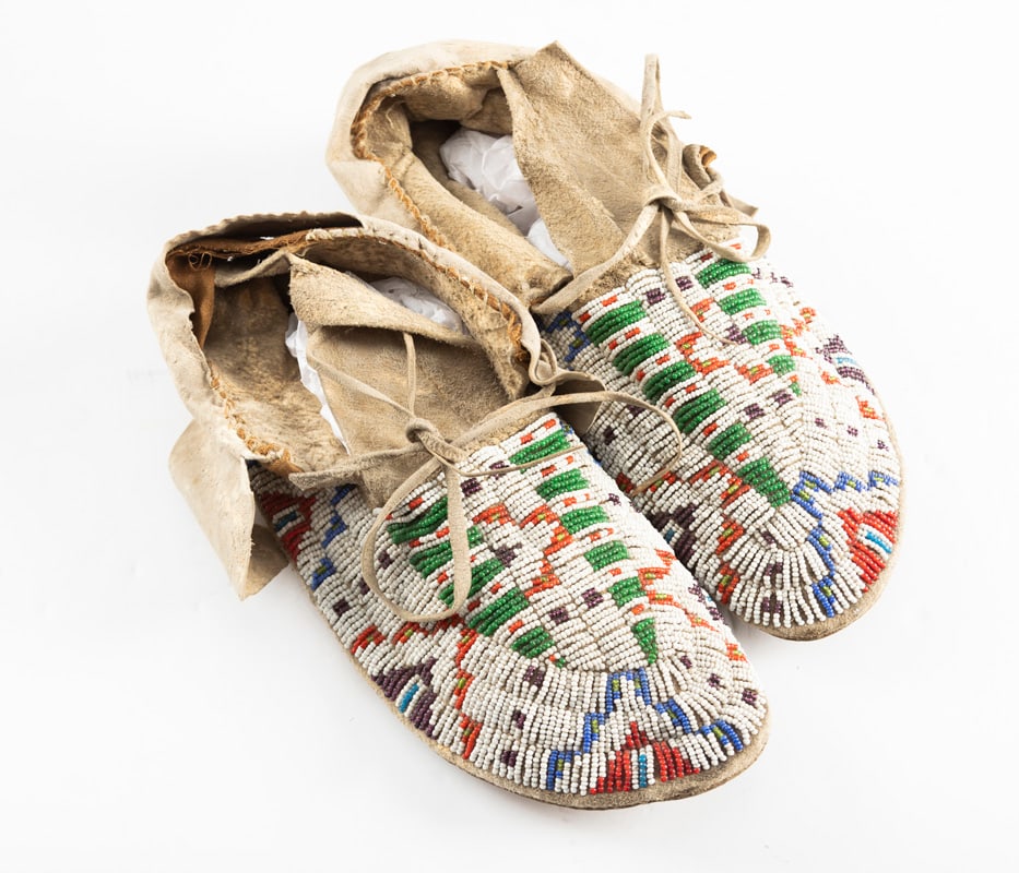 Pair of vintage Plains Indian Full Beaded Moccasins showing multi-color beads in very good: Pair of vintage Plains Indian Full Beaded Moccasins showing multi-color beads in very good condition. THE LATE CARROLL STURGIS, JR. ESTATE.