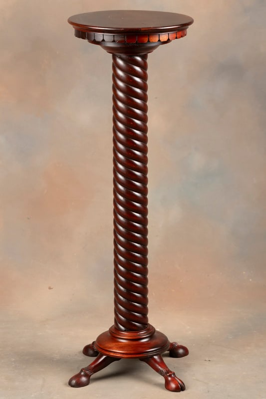 Antique mahogany Pedestal with carved deer hoof feet, circa 1910-1915, excellent finish and: Antique mahogany Pedestal with carved deer hoof feet, circa 1910-1915, excellent finish and condition, measures 30" T with 3 1/2" dia. rope twist column on 12" round top with scalloped skirt.