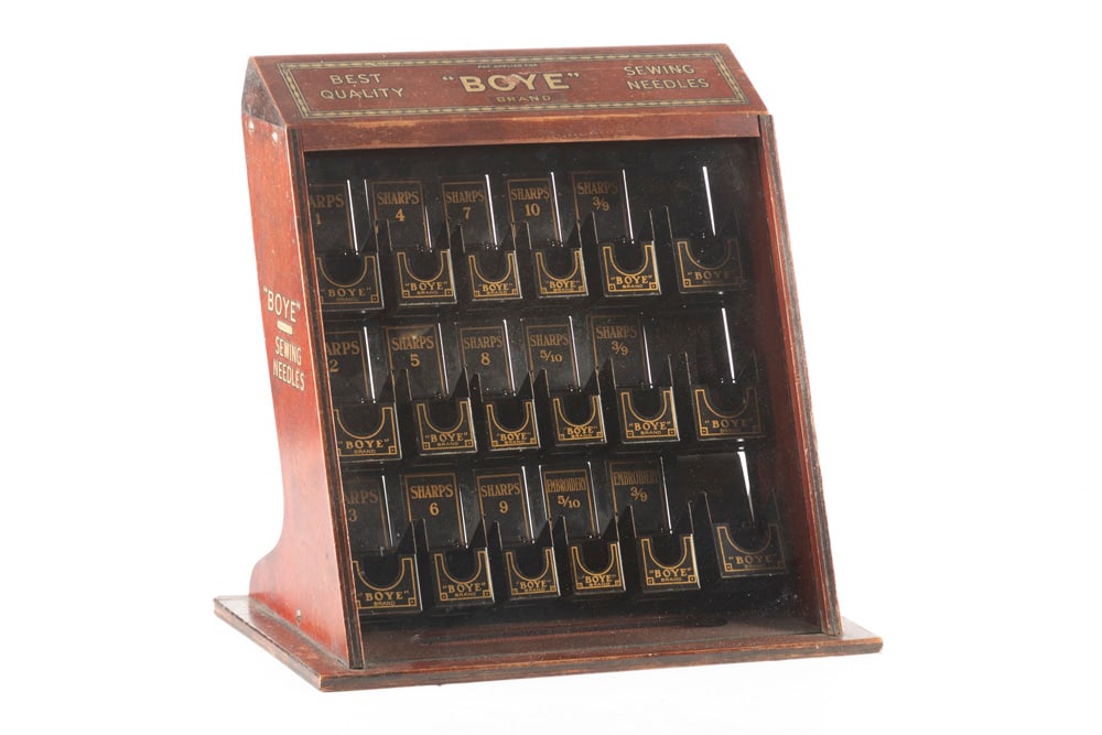 Incredible antique country store wooden, glass front Sewing Needle Display Stand for "BOYE BRAND": Incredible antique country store wooden, glass front Sewing Needle Display Stand for "BOYE BRAND" Sewing Needles. Showcase retains the majority of the original stenciling and advertising. When viewed 