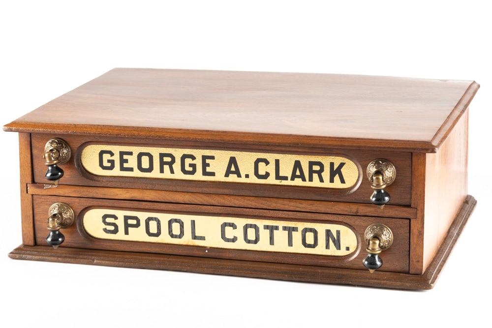 Antique two-drawer Victorian walnut Spool Cabinet, advertising George A. Clark, circa 1880-90s,: Antique two-drawer Victorian walnut Spool Cabinet, advertising George A. Clark, circa 1880-90s, original embossed brass hardware, excellent finish and condition, measures 6" T x 14" D x 2" W. THE BUDD