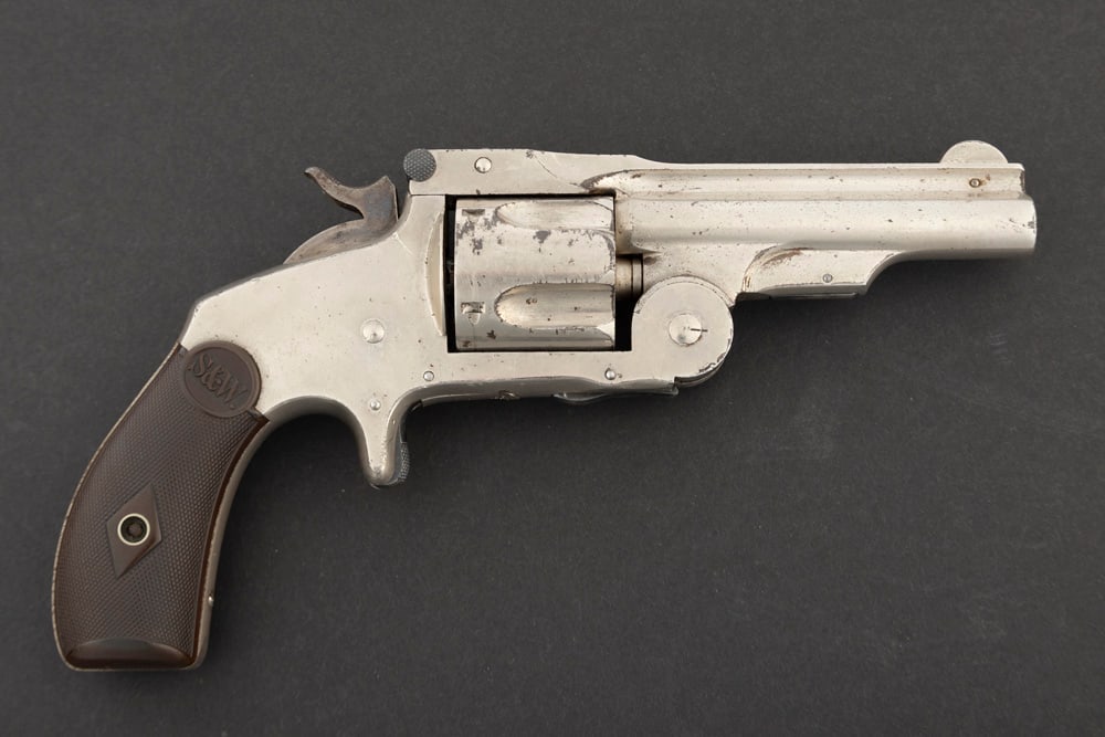 Antique Smith & Wesson 5-shot Revolver, A.K.A. Baby Russian, .38 caliber, SN 1165, manufactured: Antique Smith & Wesson 5-shot Revolver, A.K.A. Baby Russian, .38 caliber, SN 1165, manufactured 1876-1877, retains majority of original nickel finish, 3 1/4" barrel, original S&W checkered two-piece g