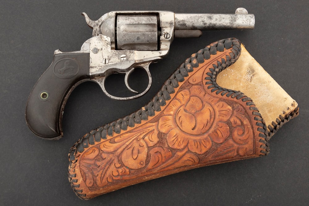 Antique Colt Model 1877 Lightning DA Revolver, .41 caliber, SN 45609, manufactured 1883, nickel: Antique Colt Model 1877 Lightning DA Revolver, .41 caliber, SN 45609, manufactured 1883, nickel finish, 3 1/2" barrel, retains much of the original nickel finish, remaining finish is spotty and shows 