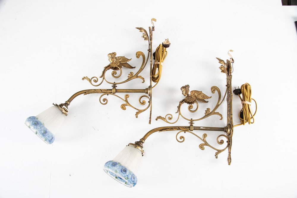 A pair of beautiful Victorian style brass Wall Sconces, circa 1915-1920, nice aged patina with: A pair of beautiful Victorian style brass Wall Sconces, circa 1915-1920, nice aged patina with matching glass shades. Sconces have 15" wall plate x 14" deep with beautiful embossed winged angels on br
