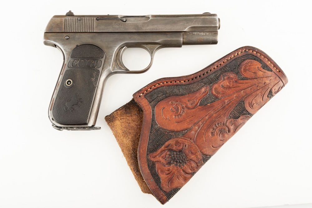 Colt Model 1903, Semi-Auto Pistol, .32 caliber, SN 262558, even gray to brown patina, 4" barrel,: Colt Model 1903, Semi-Auto Pistol, .32 caliber, SN 262558, even gray to brown patina, 4" barrel, original Colt grips. Pistol is accompanied by a vintage floral tooled Holster with belt loop. (MODERN) 