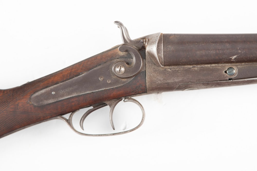 Antique Double Barrel Coach Gun manufactured by Richards, 12 ga., SN NV, smooth brown aged patina,: Antique Double Barrel Coach Gun manufactured by Richards, 12 ga., SN NV, smooth brown aged patina, 18 1/4" barrels, overall length is 34". NOTE: Unusual break down on barrels. Mechanically sound. THE 