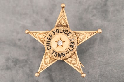 Vintage gold 5-point star Presentation Badge marked "Chief of Police/Town of Lake". Highly