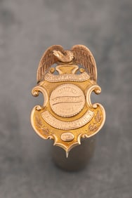 Vintage "10 Kt." gold marked Shield Badge with eagle crest. Marked "Henry S. Cooper/United States