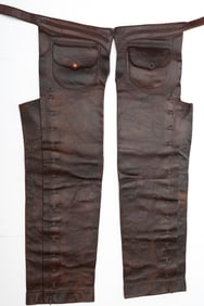 A pair of vintage "F.A. Meanea, Cheyenne" marked leather Stove Pipe Chaps with leather laced border