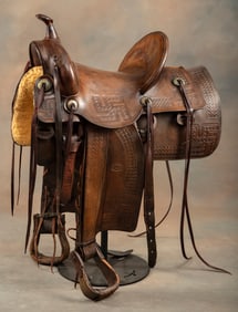 Unique vintage "R.T. Frazier, Pueblo, Colo." marked high back tooled Saddle, 14" seat, 5" cantle.