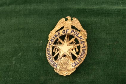Large vintage Circle Star Badge with winged eagle crest marked "Chief of Police/Santa
