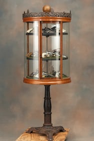 Rare antique Oak Crystal Cabinet on ornate iron base, dated January 1900, made in Alliance Ohio,