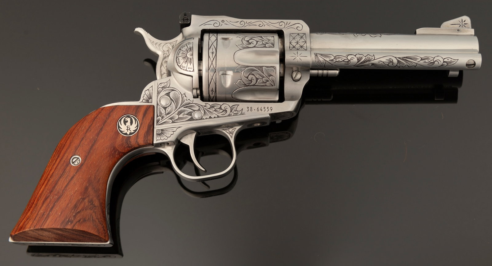 One of a pair of beautifully engraved Ruger New Model Blackhawk SA Revolvers engraved by Louisianna: One of a pair of beautifully engraved Ruger New Model Blackhawk SA Revolvers engraved by Louisianna Master Engraver Eddie Viola, .45 Long Colt caliber, SN 38-64559, stainless finish, 4 1/2" barrel, ne