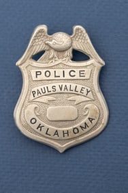 Vintage Shield Badge with winged eagle crest, silver tone, marked "Police/Pauls Valley/Oklahoma",