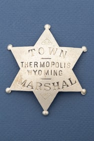 Large vintage 6-point ball star Badge marked "Town/Thermopolis, Wyoming/Marshal" with hallmark
