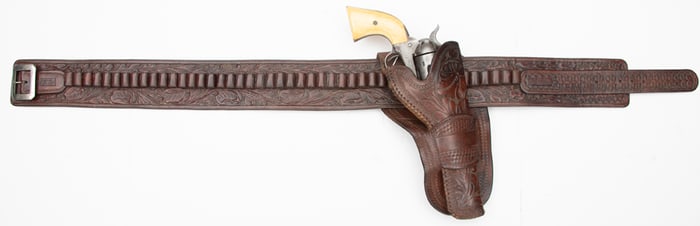 Vintage "Al Furstnow/Miles City, Mont." marked, floral carved Belt and matching Holster. The belt is