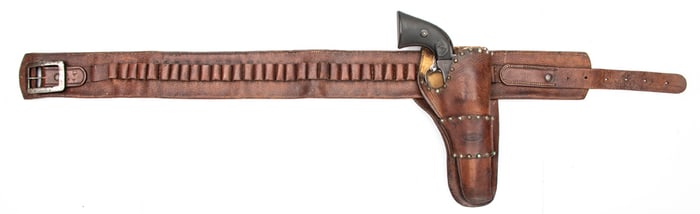 "Tulsa, Okla." marked Holster with Money Belt. The single loop holster has nickel plated brass spots
