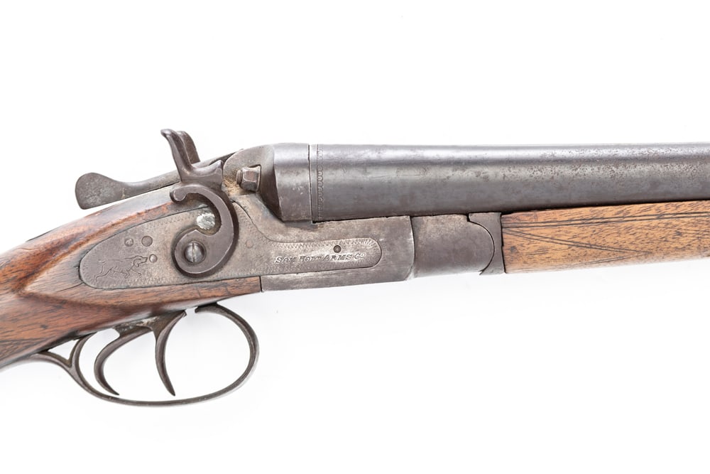 Antique double barrel Coach Gun by Sam Holt Co., 12 gauge, SN NV, 18" barrel, 35" overall length,: Antique double barrel Coach Gun by Sam Holt Co., 12 gauge, SN NV, 18" barrel, 35" overall length, overall good condition for its age, barrels are marked "Belgium Laminated Steel", EARLE ESTATE.