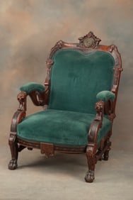 Fine unique walnut Victorian Rennaissance Period Arm Chair with claw feet and lion head arms, circa