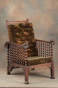 Unique antique quarter sawn oak Morris Chair, circa 1900, with carved lion head arms and adjustable