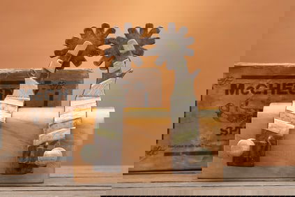 Rare original McChesney Spur Picture Box that contains a pair of single mounted "McChesney" marked