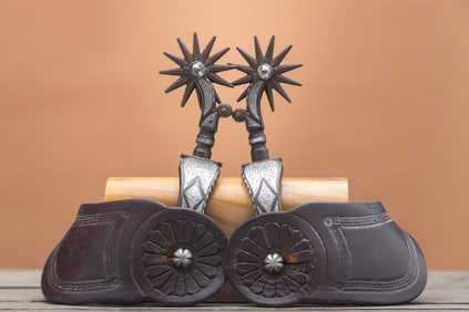 Beautiful pair of single mounted Spurs with hand engraved silver, possibly Morales, California style