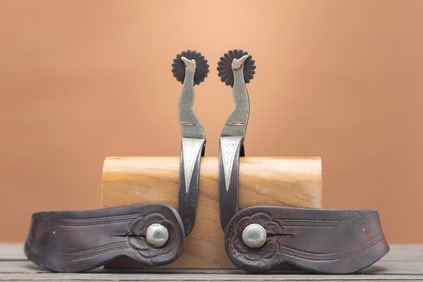 Unique pair of double mounted, silver overlay gal-leg Spurs shows great craftsmanship. Mounted with