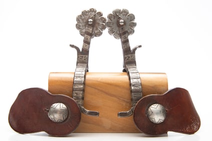 Pair of early Spurs with silver inlay, double mounted with Cheyenne split heel bands and chap