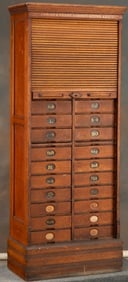 Outstanding antique quarter sawn oak roll front File Cabinet in original finish with original