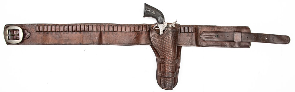 Fantastic Meanea Holster with Collins & Morrison Money Belt. This double loopholster has a full: Fantastic Meanea Holster with Collins & Morrison Money Belt. This double loopholster has a full basket weave design stamped on the pocket and the front of theloops. The bottom loop has the makers stam