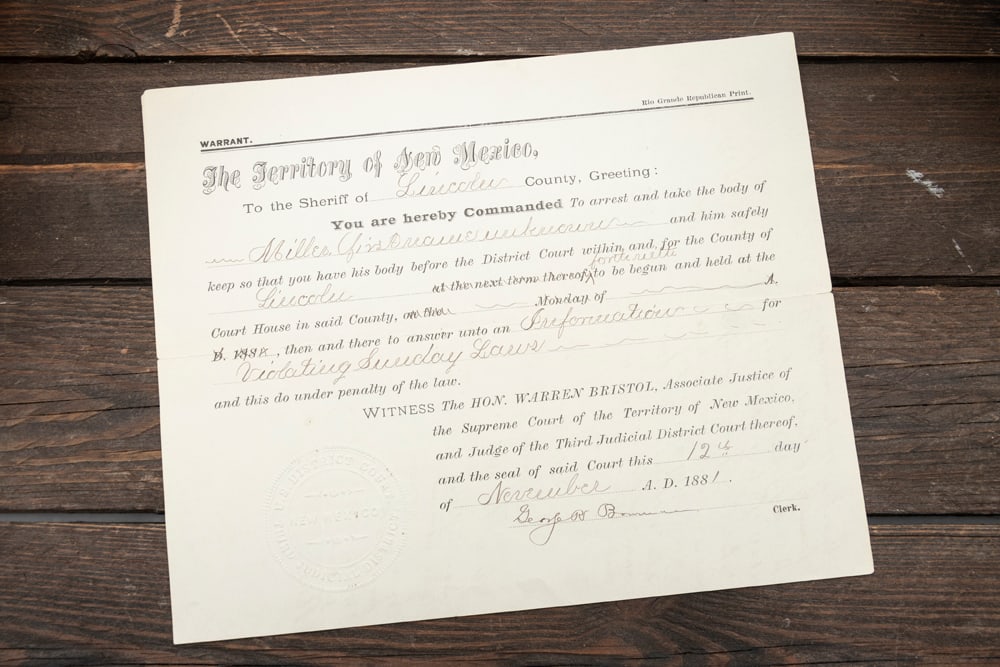 Historical Warrant signed by Pat Garret, Sheriff, Lincoln County, November 12,1881: Historical Warrant signed by Pat Garret, Sheriff, Lincoln County, dated November 12, 1881. The warrant is for a Mr. Miller, document measures 7" x 8 1/2". Accompanied by a typed letter by the Earles p