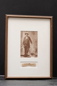 A framed Image of John Wesley Hardin, below image is an actual signature "J.W. Hardin, Austin,
