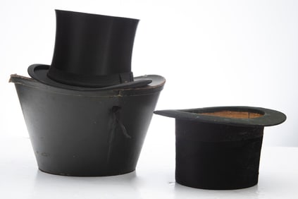 A pair of early Top Hats, one is silk, one is beaver, circa 1890-1900. Silk Hat has its original Hat