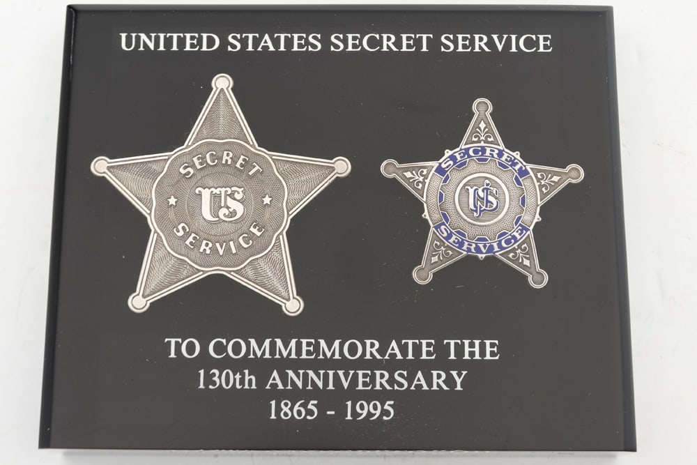 Beautiful Commemorative Paperweight commemorating 130th Anniversary of the United States Secret: Beautiful Commemorative Paperweight commemorating 130th Anniversary of the United States Secret Service. Showing two Badges under Lucite, 5" T x 6" W. Accompanied by a cased set of two "United States