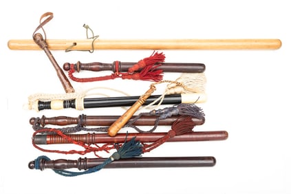 This lot will consist of  a collection of 8 wooden and leather Night Sticks (Billy Clubs), measuring