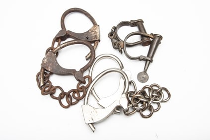 This lot will consist of 3 pairs of iron Wrist & Leg Cuffs to include:  (1) One pair of Leg Cuffs is