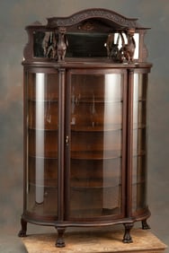 Ornate antique oak, triple curved glass China Cabinet with winged griffin, mirrored, 19" hooded top