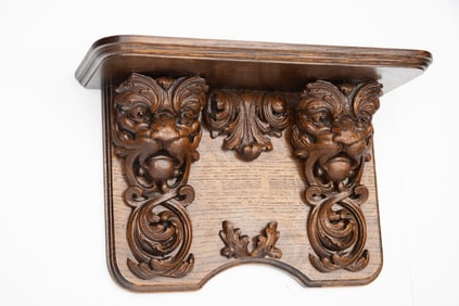 Beautiful antique quarter sawn oak Wall Shelf with raised floral carving and lion heads. Excellent