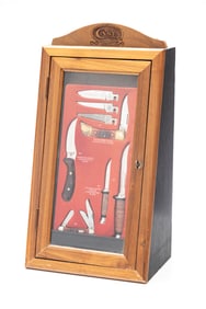 Factory Cased W.R. Case & Sons Cutlery Co. since 1889, this tapered tall wooden and glass front