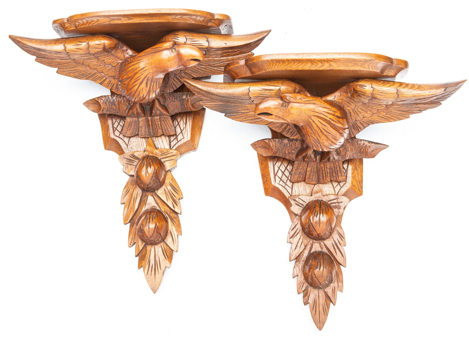 THIS LOT WILL BE SOLD TWO (2) TIMES YOUR BID, MEANING YOUR FINAL BID WILL BE MULTIPLIED TWO TIMES:: THIS LOT WILL BE SOLD TWO (2) TIMES YOUR BID, MEANING YOUR FINAL BID WILL BE MULTIPLIED TWO TIMES: A fine pair of early walnut Victorian hanging Shelves, circa 1890s-1910, with fully carved wing sprea