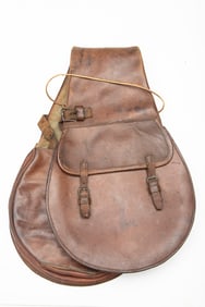Unique pair of vintage leather Saddlebags with outside flap pockets and unusual outside open