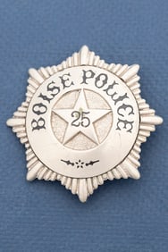 Vintage Starburst Badge marked "Boise Police" in circus lettering and "25" in raised star center