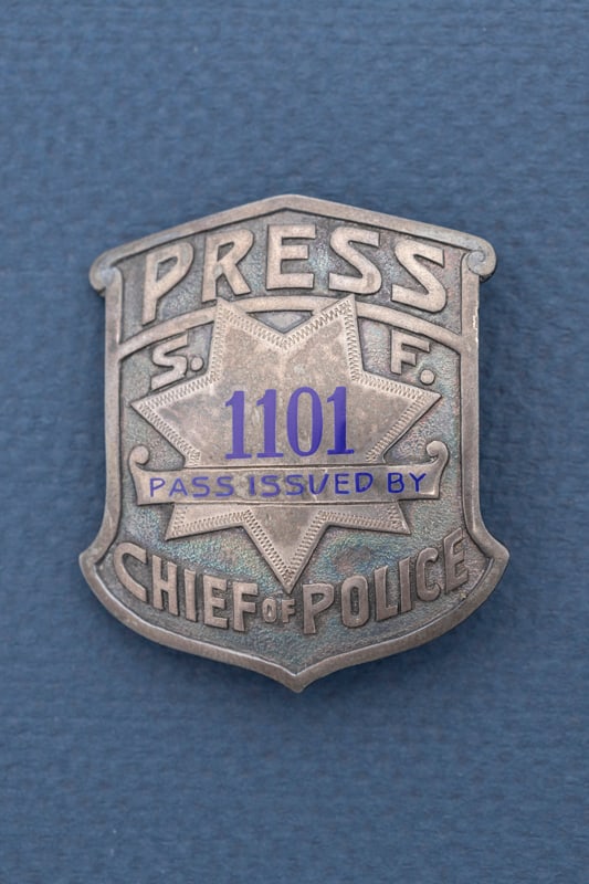 Vintage Shield Badge marked "Press / 1101 / Pass Issued By / Chief of Police", the raised 7-point: Vintage Shield Badge marked "Press / 1101 / Pass Issued By / Chief of Police", the raised 7-point star in center has initials "S" between 6th & 7th point and "F" between 1st & 2nd points on star. In g