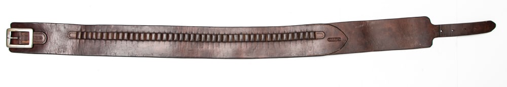 Fine leather Cartridge Belt, 2 1/4" W, double marked "F.A. Meanea / Cheyenne, Wyo." for a 42-44": Fine leather Cartridge Belt, 2 1/4" W, double marked "F.A. Meanea / Cheyenne, Wyo." for a 42-44" waist. Loops appear to be for a .38 caliber Revolver. HUTCHESON COLLECTION.