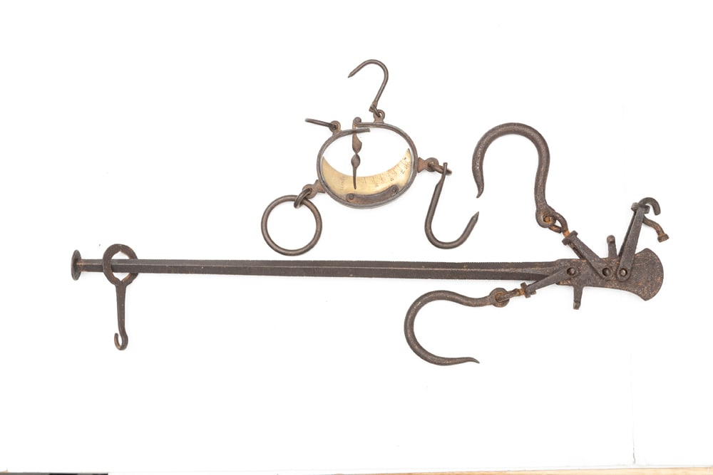 Two early cast iron Buffalo Hide Scales, one has weight numbers up to 40 pounds, with brass face,: Two early cast iron Buffalo Hide Scales, one has weight numbers up to 40 pounds, with brass face, appears to be complete. EARLE ESTATE.