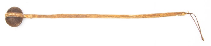 Early War Club with stone hammer, shaft measures 27 1/2" L, wrapped with rawhide and sinew sewn.