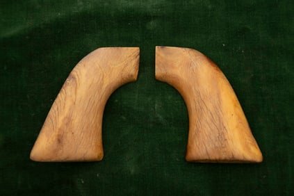 Pair of early one-piece Ivory Grips for a Colt SAA Revolver showing nice yellow aged patina.