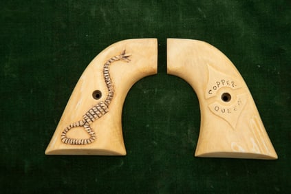 Pair of carved Bone Grips with rattlesnake on right grip and the name "Copper Queen" on the left.